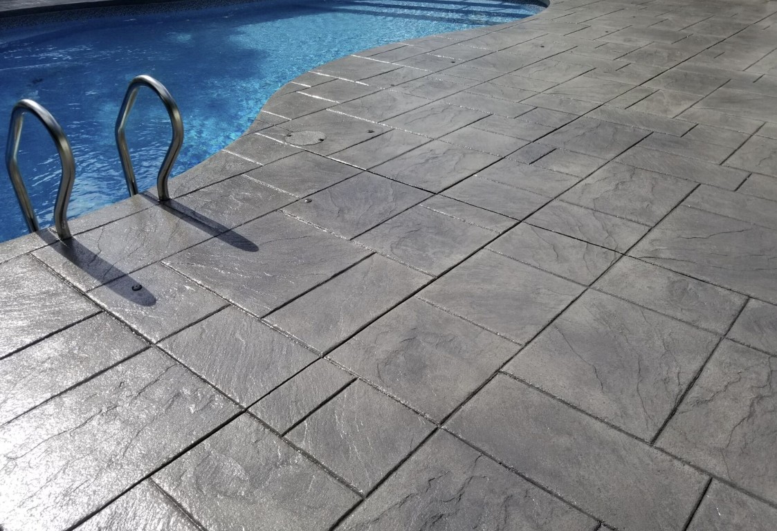 Concrete pool deck pavers installation in Kent, OH