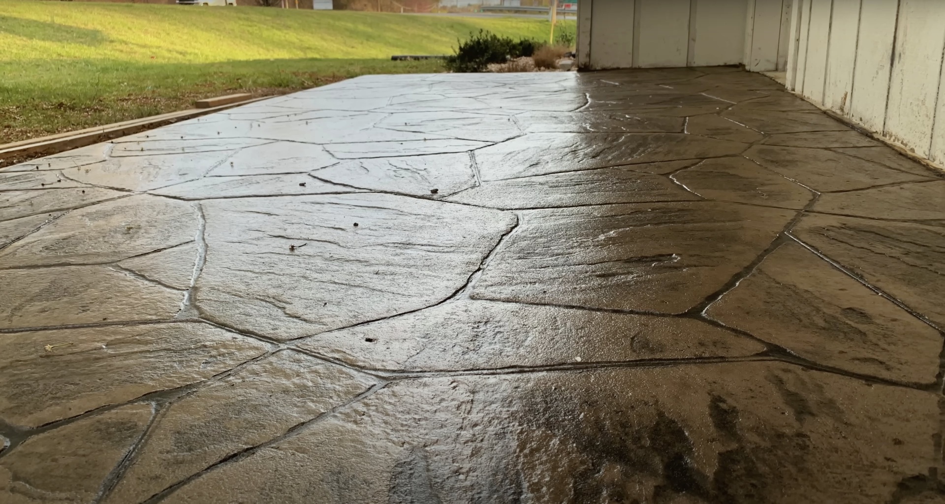 Cracked concrete driveway showing need for professional concrete repair services