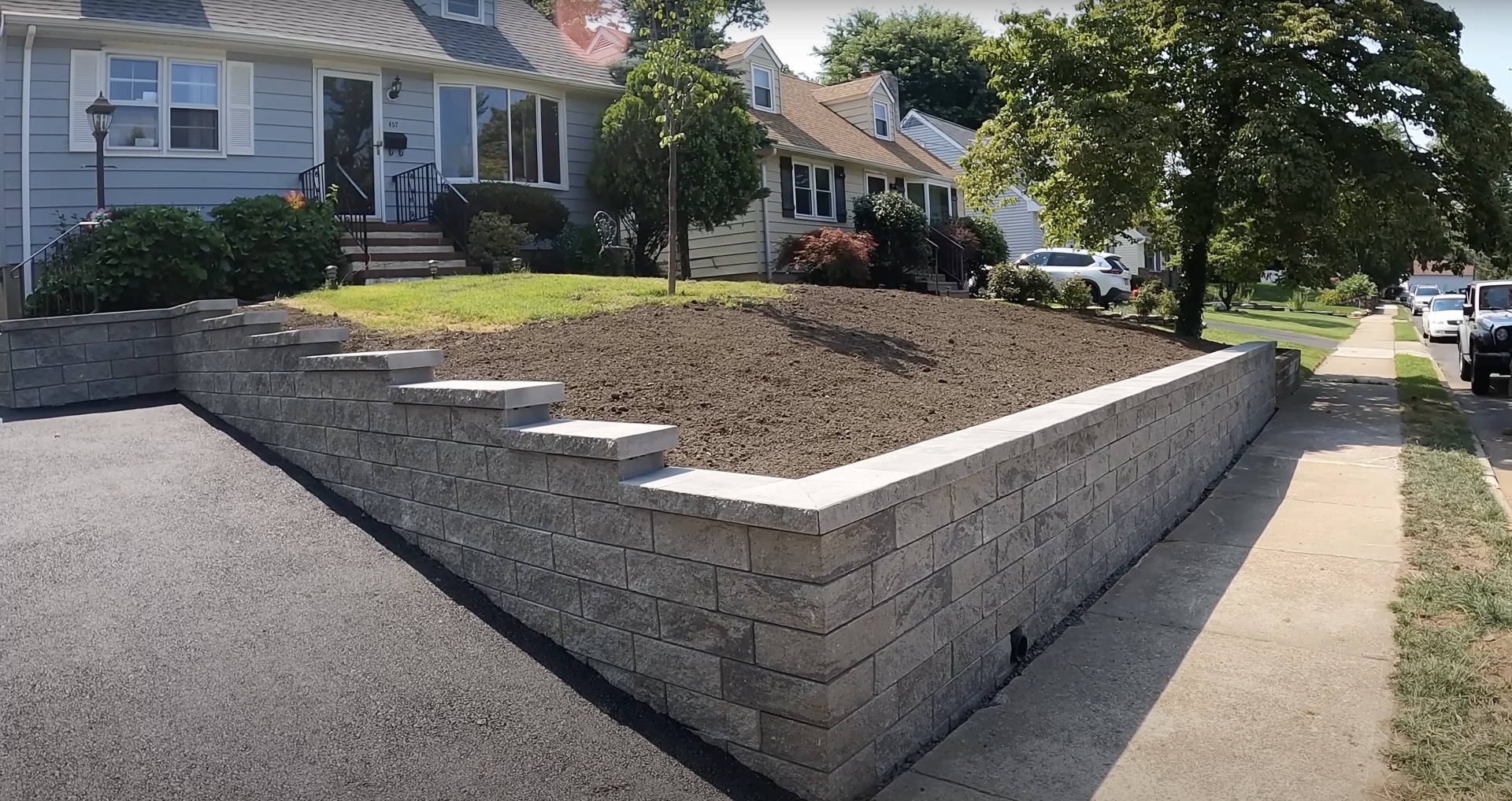 Professional concrete driveway construction with proper base preparation and reinforcement