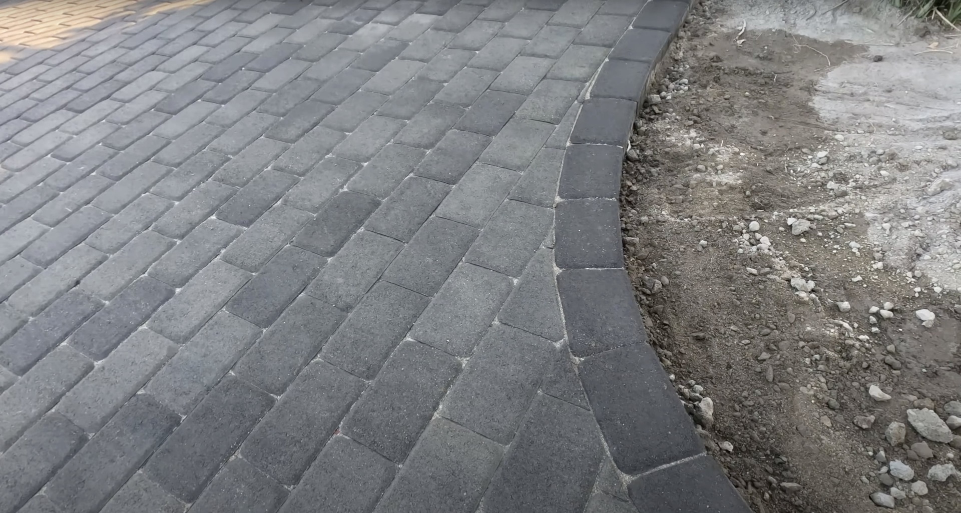 Beautiful stamped concrete paver installation with professional pattern design